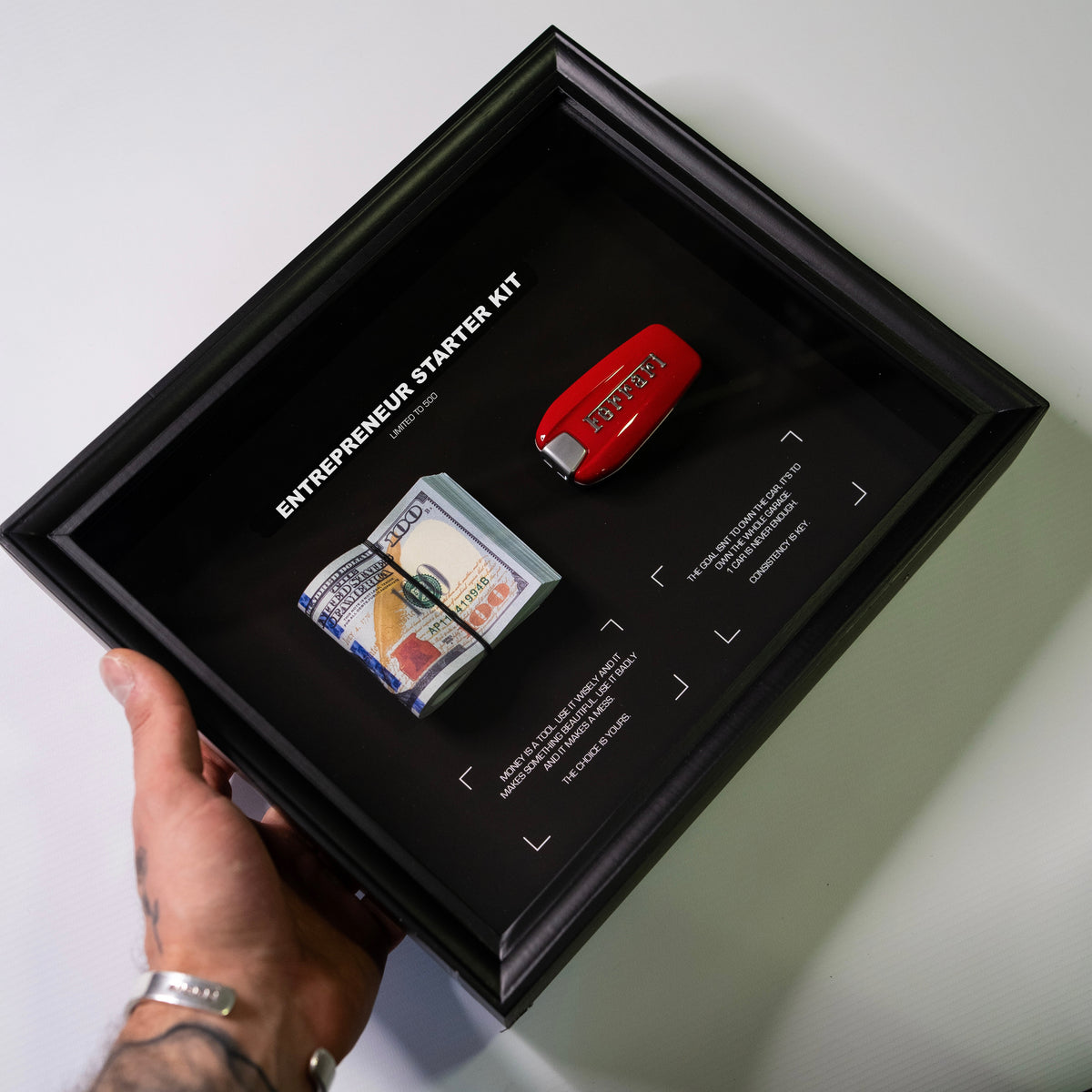 Entrepreneur Starter Kit Ferrari angled view showing depth of framed artwork and bundle contents