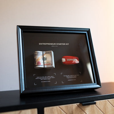 Entrepreneur Starter Kit Ferrari all items laid out showing framed artwork, lighter, and accessories bundle