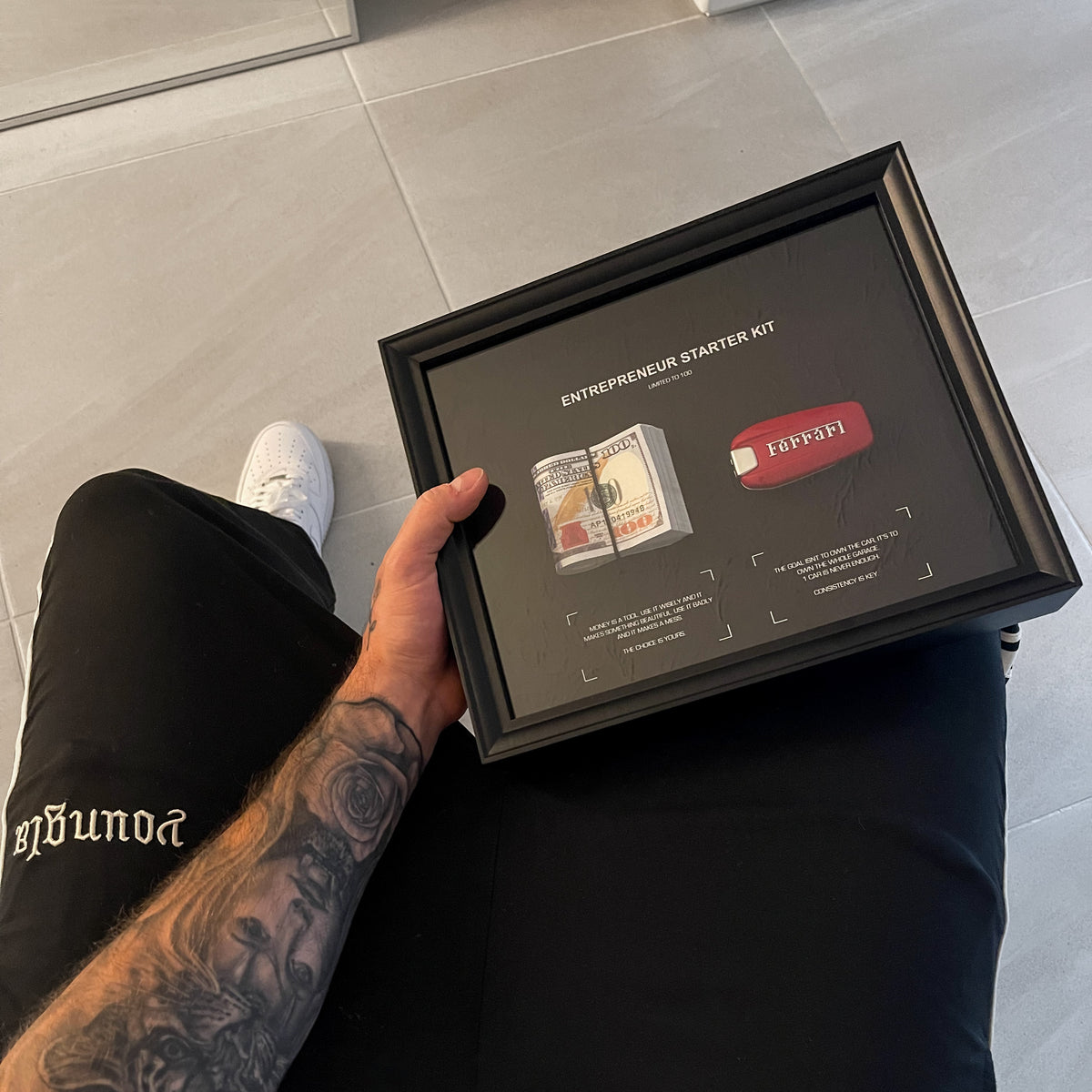 Entrepreneur Starter Kit Ferrari lifestyle wall display showing framed artwork mounted in home setting