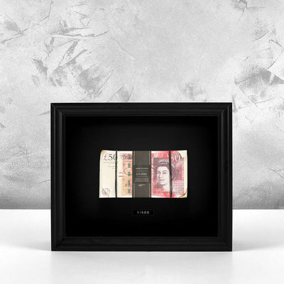 Aged Stacked Frame GBP front view, single stack of aged British pound notes behind glass in a black frame by Apart Studio